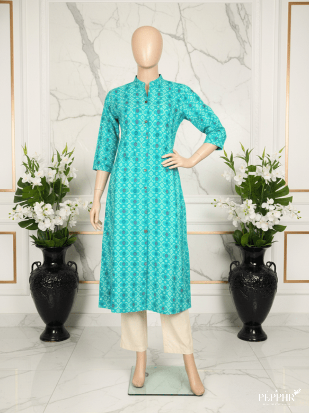 Green A-line Kurti on mannequin