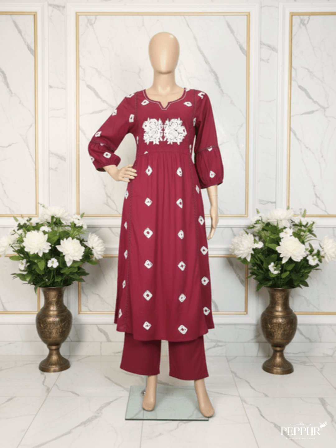 Maroon Anarkali Style Kurti Pant Set on mannequin